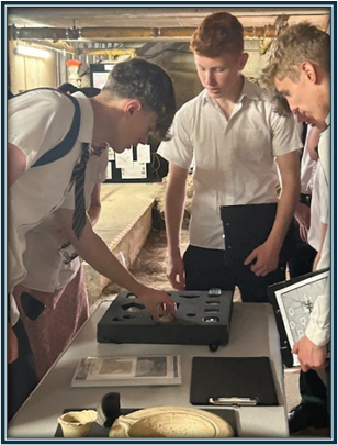 Students looking at Roman Coins