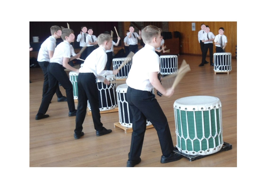 students drumming